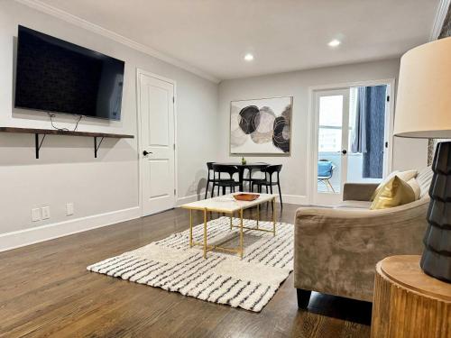 a living room with a couch and a table at City View Newly Renovated 3 Beds with Free Parking LM1809 in Atlanta