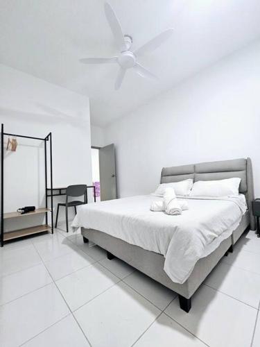 a white bedroom with a bed and a mirror at HM Residence IIII 3km - Setia City Convention in Shah Alam