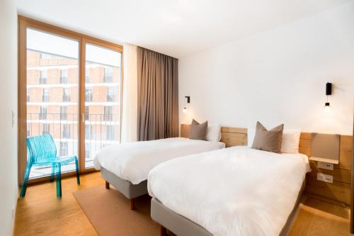 Gotthard Hotel Apartmentにあるベッド