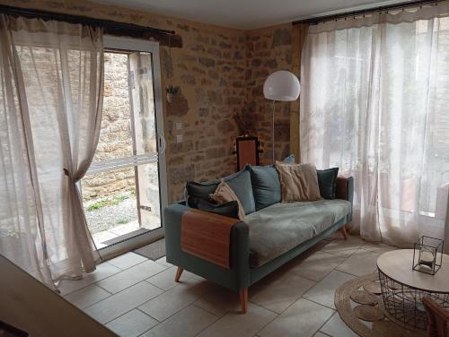 Χώρος καθιστικού στο Gîte La Forge proche Rocamadour, Padirac