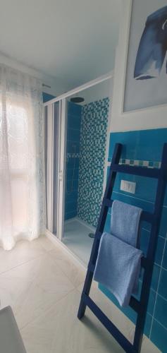 Postel nebo postele na pokoji v ubytování Casa Vacanze SANTAFE'- ATTICO a due passi dal Mare - PARCHEGGIO Privato