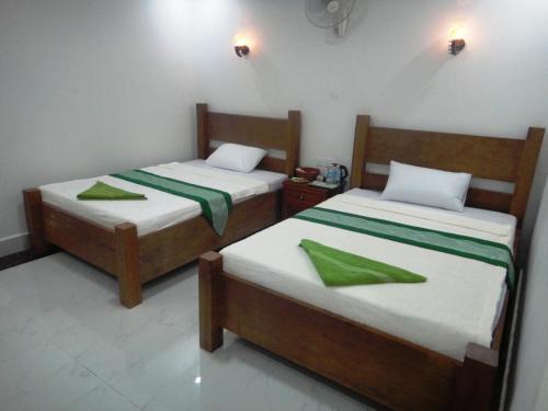 Una cama o camas en una habitación de Marany Guesthouse