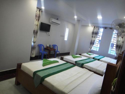 Una cama o camas en una habitación de Marany Guesthouse