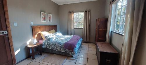 Ένα ή περισσότερα κρεβάτια σε δωμάτιο στο Wildevy Accommodation