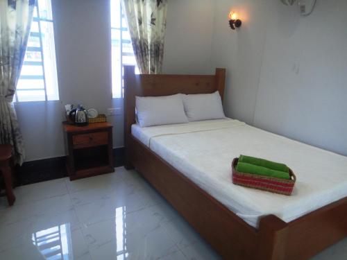 Una cama o camas en una habitación de Marany Guesthouse