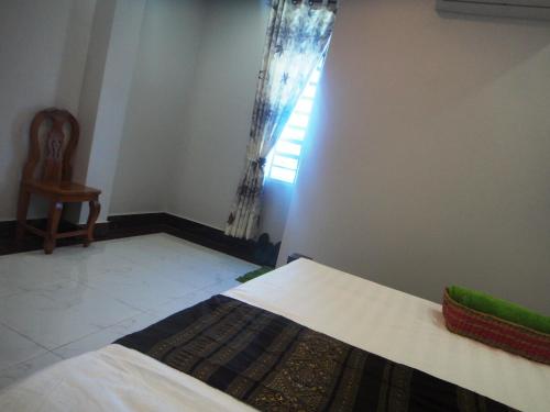 Una cama o camas en una habitación de Marany Guesthouse
