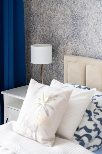 Postel nebo postele na pokoji v ubytování Apartamenty Deluxe