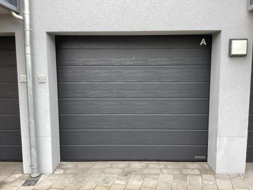 a garage door with the letter a on it at AMBERG APART - Apartment A - Wohnraum auf Zeit in Amberg