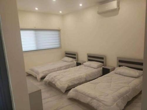 Voodi või voodid majutusasutuse Jabal ramtha hostel toas