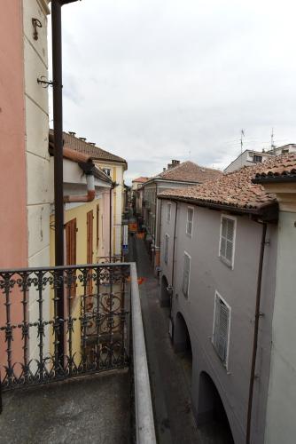 a view of an alley between two buildings at Belvedere Campanon in Nizza Monferrato