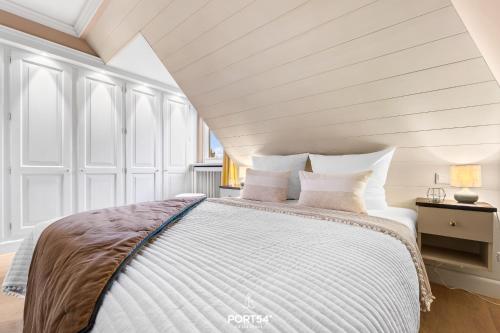 Ένα ή περισσότερα κρεβάτια σε δωμάτιο στο Ferienwohnung Strandflieder Archsum Sylt