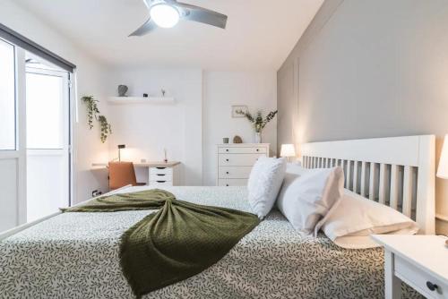 Postel nebo postele na pokoji v ubytování Bakea Home Gran Canaria