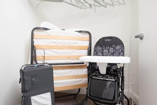 a room with a bunk bed with a skateboard on it at Lux Studio 2xQueen beds Gym near MIT Harvard in Cambridge