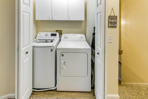 a laundry room with a washer and dryer at 2 Mi to Rehoboth Beach Home with Sunroom! in Rehoboth Beach