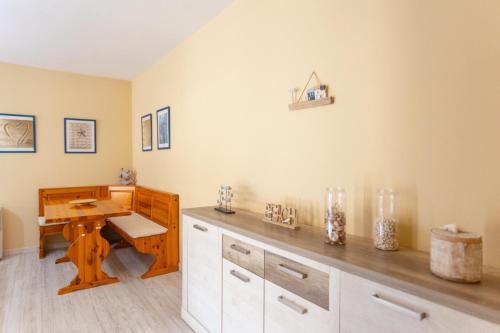 a room with a desk and a wooden table at Azul Zahara in Zahara de los Atunes