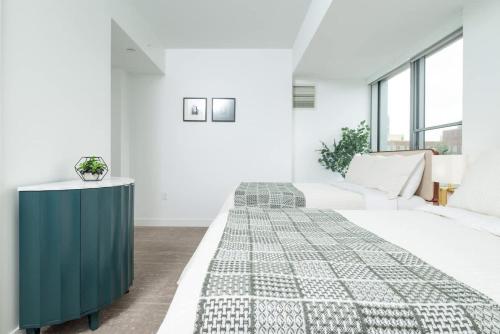 Katil atau katil-katil dalam bilik di Central Space to Balance Life Work Play 7 Sleeps
