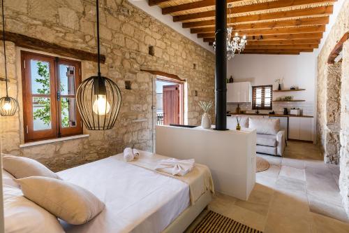 Postel nebo postele na pokoji v ubytování The calopes suites