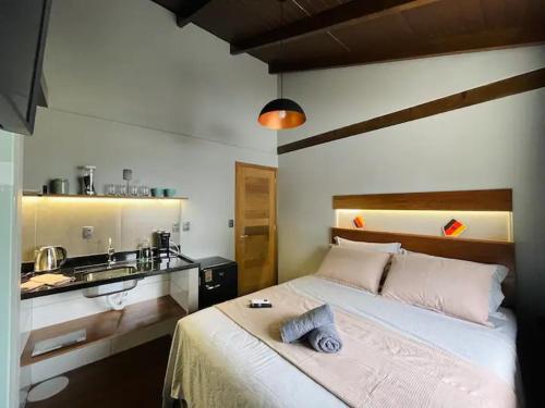 Ένα ή περισσότερα κρεβάτια σε δωμάτιο στο Loft 204 em frente à Vila Germânica Oktoberfest- Villa Haus