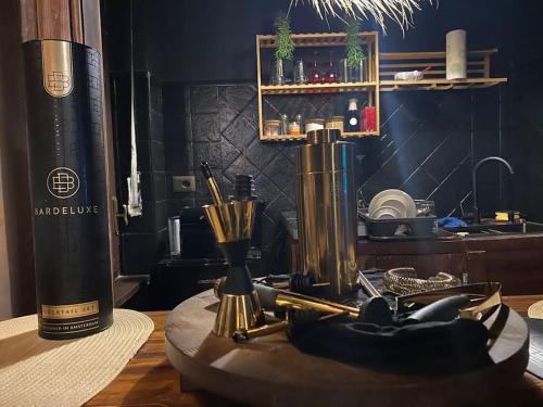 a table with a bottle of wine on a table at Luxury Relax Idromassaggio in Meana di Susa