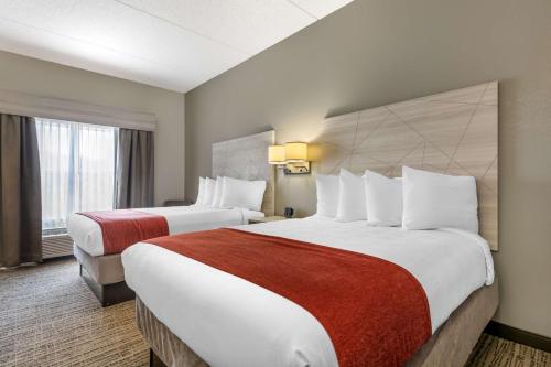 Ένα ή περισσότερα κρεβάτια σε δωμάτιο στο Best Western Plus Lake City