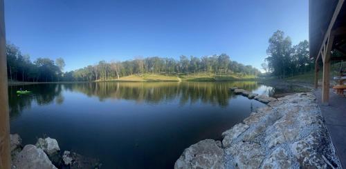 a view of a lake with trees in the background at Cozy Cabin Retreat for Your Perfect Getaway in Imperial