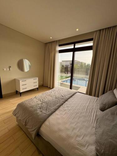 Postel nebo postele na pokoji v ubytování Hawana Salalah Resort - CM46