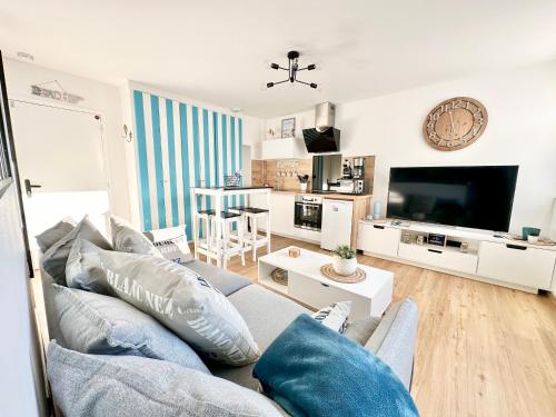 TV a/nebo společenská místnost v ubytování La Cabine d HARDELOT Plage à 3mn à pied