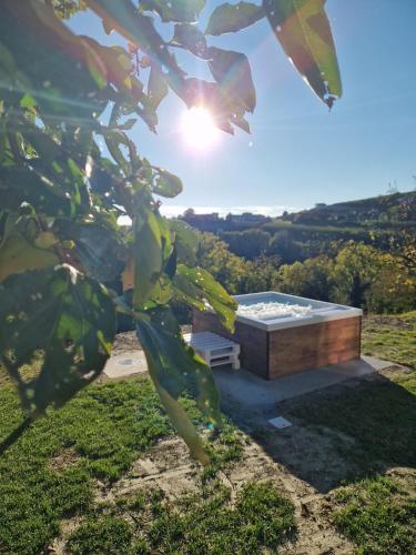 a building with a bench on top of a hill at CÁ d ANGELO in Canove