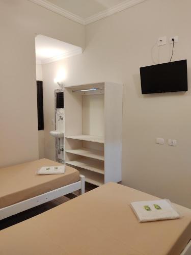 Katil atau katil-katil dalam bilik di Jaguaré Hotel