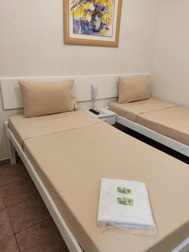 Katil atau katil-katil dalam bilik di Jaguaré Hotel
