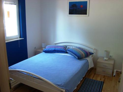 Postel nebo postele na pokoji v ubytování Apartments Pinus