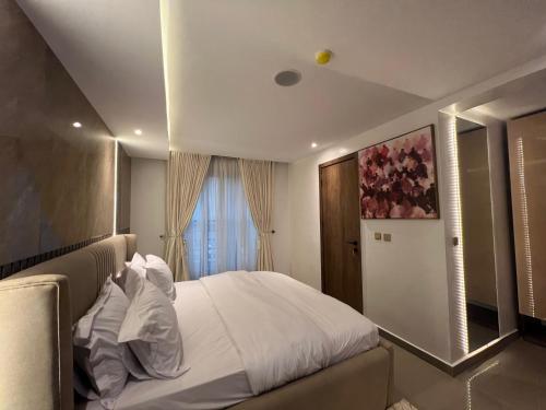 Cama o camas de una habitación en Luxury 2 Bedrooms Apartment with Plastation 5