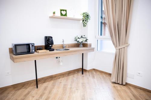 Kuchyň nebo kuchyňský kout v ubytování Dimora Diaz B&B
