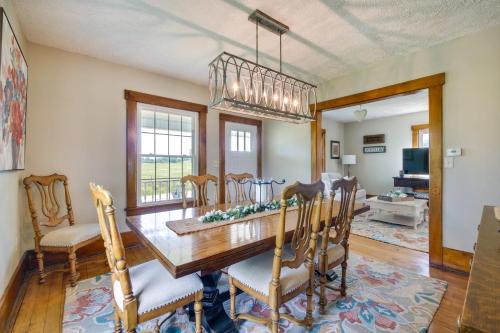 a dining room with a table and chairs at Countryside Home in Wooster with Patio and Fire Pit in Wooster