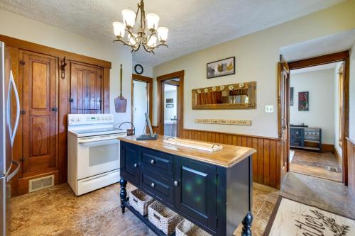 a kitchen with a stove and a counter top at Countryside Home in Wooster with Patio and Fire Pit in Wooster