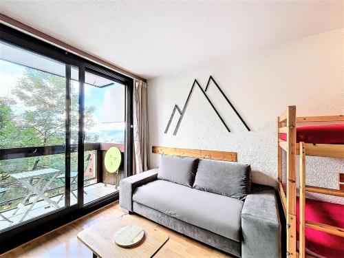 En eller flere senge i et værelse på Résidence Pegase - STUDIO 4 PERSONNES MAE-0631