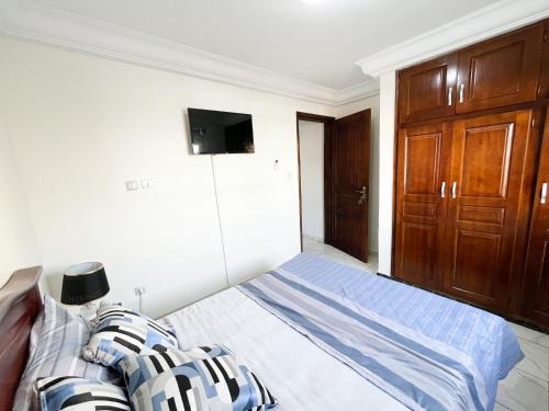 Ένα ή περισσότερα κρεβάτια σε δωμάτιο στο Studio Cosy centre AKWA