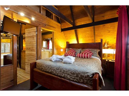 Säng eller sängar i ett rum på The Mouses House Rainforest Retreat