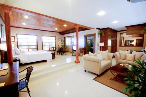 Posezení v ubytování Citystate Asturias Hotel Palawan