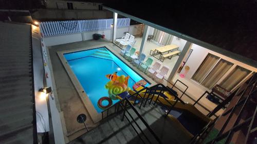 an overhead view of a swimming pool in a house at Family Pool Villa Chaam in Cha Am