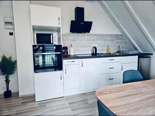 Kuchnia lub aneks kuchenny w obiekcie Spacieux - Parking Gratuit - Proche de Strasbourg