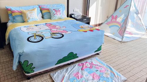a bedroom with a bed with a winnie the pooh bedspread at Junluxe Hotel Guangzhou Zengcheng-Free Shuttle Bus For Canton Fair in Zengcheng