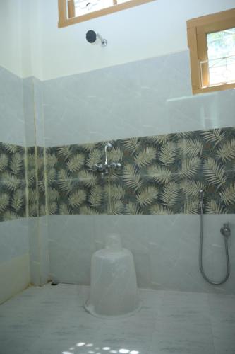 Un baño de Axom Aura