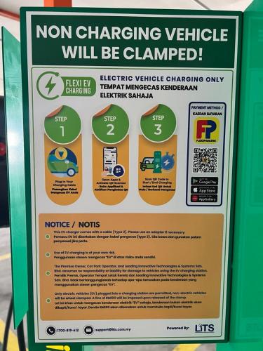 a sign for a non changing vehicle will be clamped at Courtyard by Marriott Melaka in Melaka