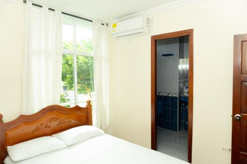 Postel nebo postele na pokoji v ubytování HOTEL GAIRA MAR