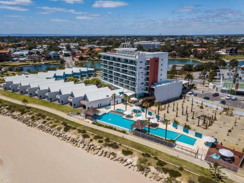 an aerial view of a resort with a swimming pool at 5 Star Mandurah Beach Exclusive Apt in Mandurah