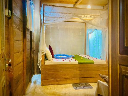 Una cama o camas en una habitación de Coconut Island Yala