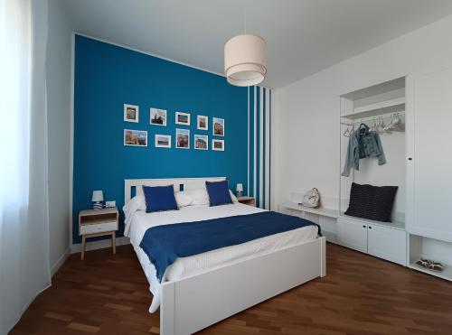 A bed or beds in a room at Al Duca appartamento in centro