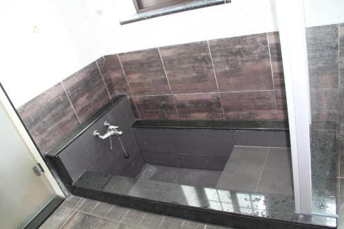 Ein Badezimmer in der Unterkunft Hasayaki Homestay