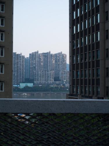 a view of a city with tall buildings at 重庆复古阁楼酒店 in Chongqing